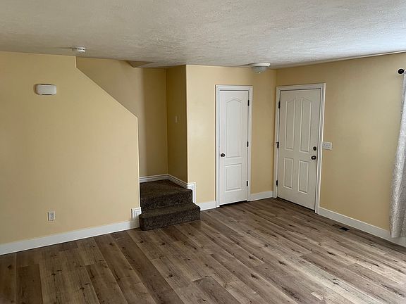 Front door- living room - hall closet -stairs to upstair bedrooms