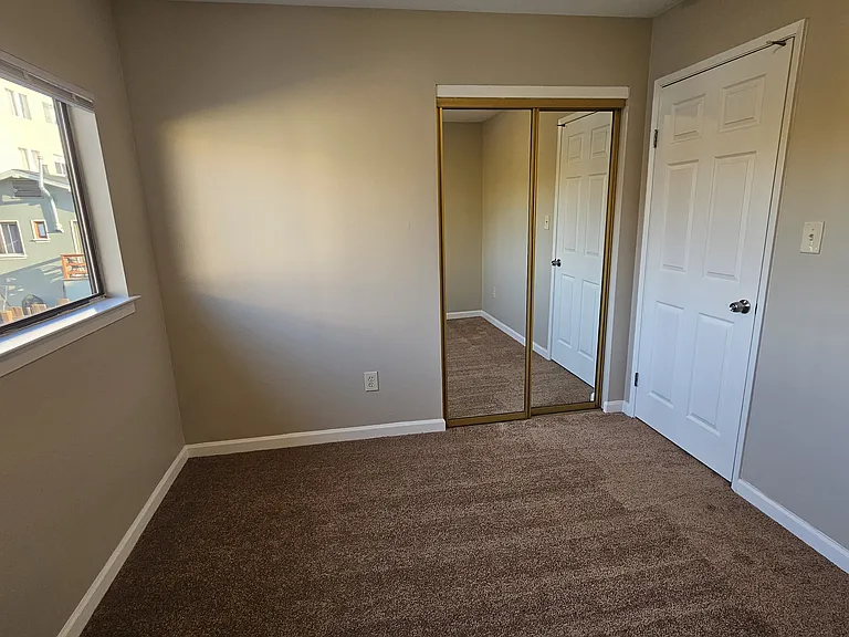 Bedroom #1 with ample natural light