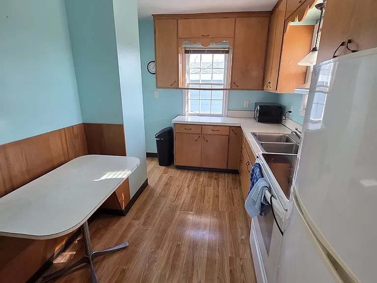 Kitchen with built-in breakfast nook.