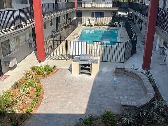 Back View of Courtyard with Pool and BBQ Area