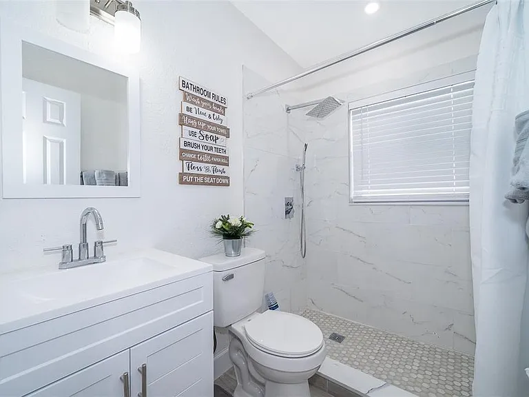 5815 Wolf Rd — Photo 18