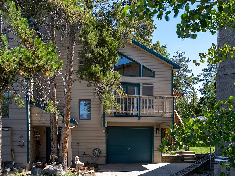 The unit is is one half of a duplex and offers a private driveway and garage suitable for a small or mid-size car.