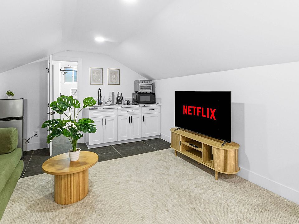Studio features a smart TV with streaming apps, perfect for movie nights, binge-watching, or catching up on shows, offering entertainment and comfort.