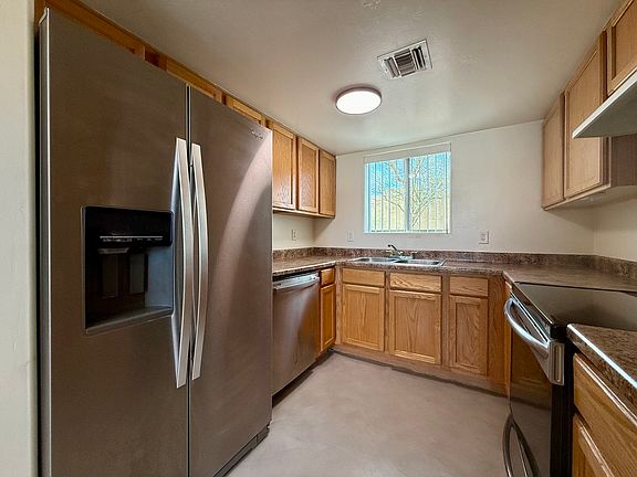 Kitchen, Stainless electric range dishwasher, Refrigerator with ice maker