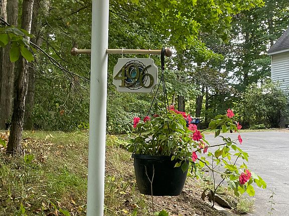 Driveway lamp post and two parking spots