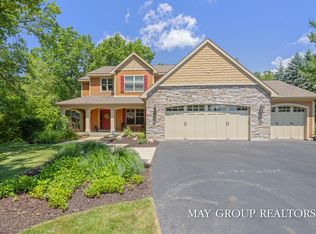 5254 Canyon River Dr NE, Ada, MI 49301