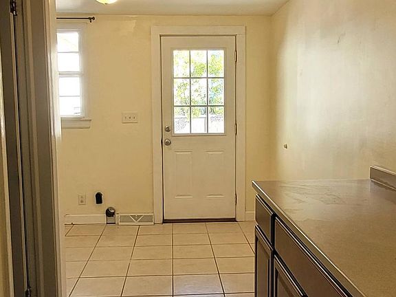 Mud room with laundry hook up and storage