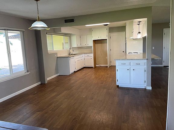 Open floor plan; kitchen overlooked the family room and has a large dining room area.