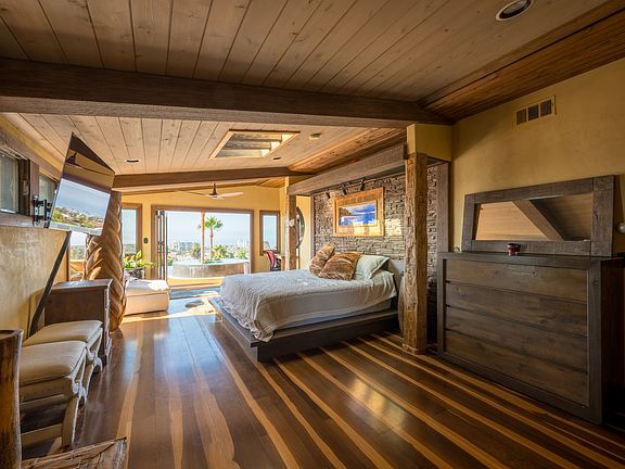 Master Bedroom looking south to the pool deck where your hot tub awaits you.