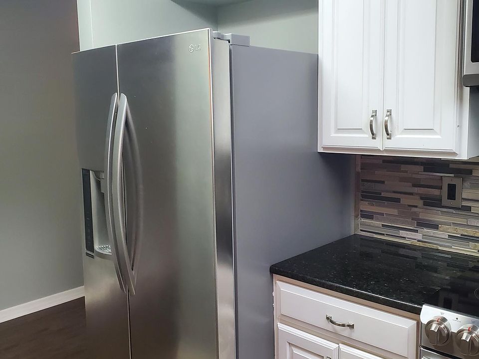 1st image of 8940 Village Green Blvd