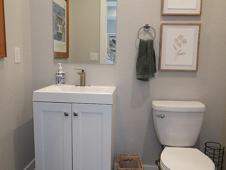 2nd floor bathroom near dining room, kitchen, and living room
