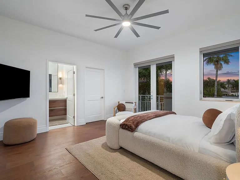 Drift into relaxation in the dreamy Guest bedroom with endless sunset views.