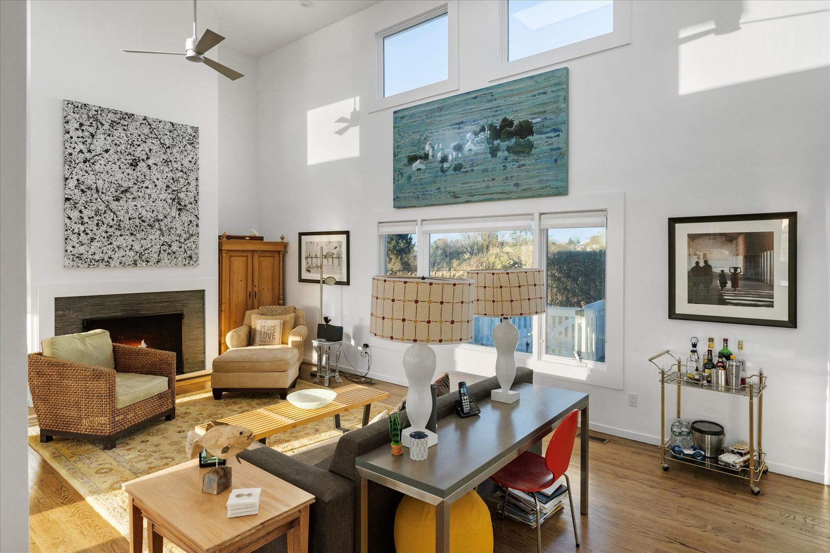 Open floor plan with walls of glass in that engage the grand interior space.