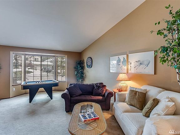 The living room also boasts a lovely bay window.