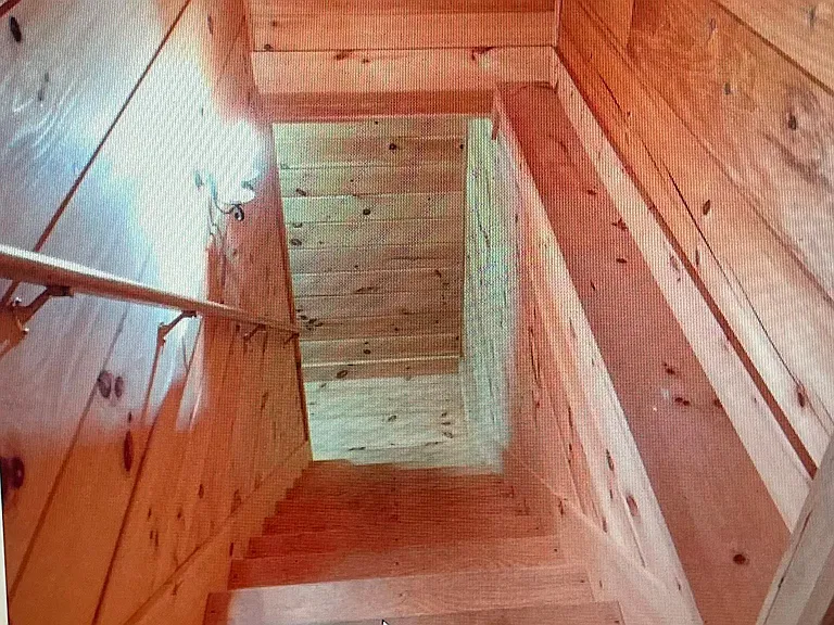 stairway to downstairs playroom and bedrooms