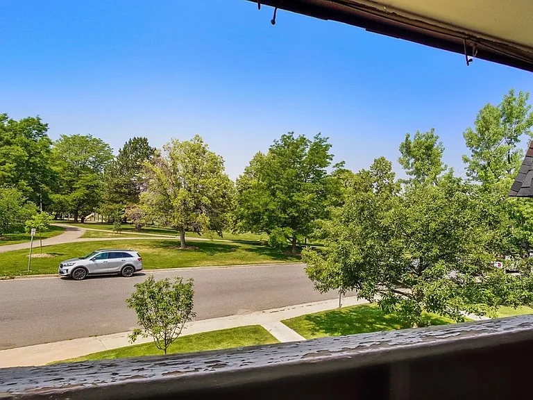 View of Southmoor Park from your front patio, you can also usually see the mountains peaking out between the trees!