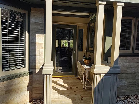 Tiled foyer and front facade