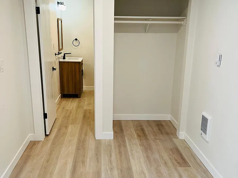 Closet space in bedroom and more storage closet space in main living room
