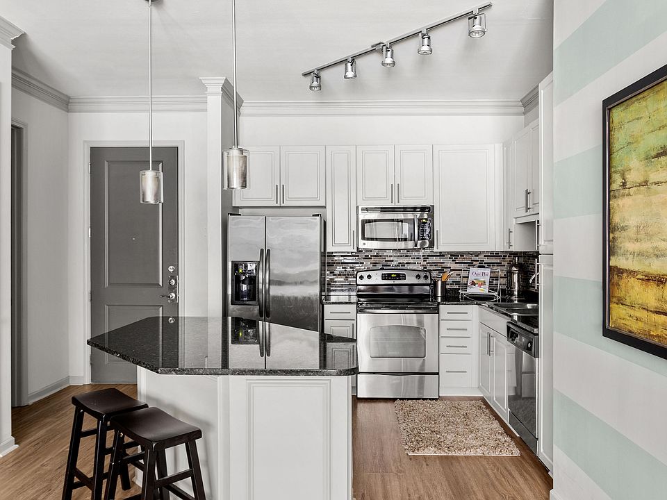 Experience modern elegance with this beautifully designed kitchen, perfect for culinary enthusiasts.