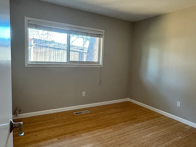 2nd Bedroom on the main floor with organized closet