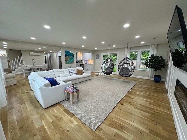 Main living area with large TV for entertainment.