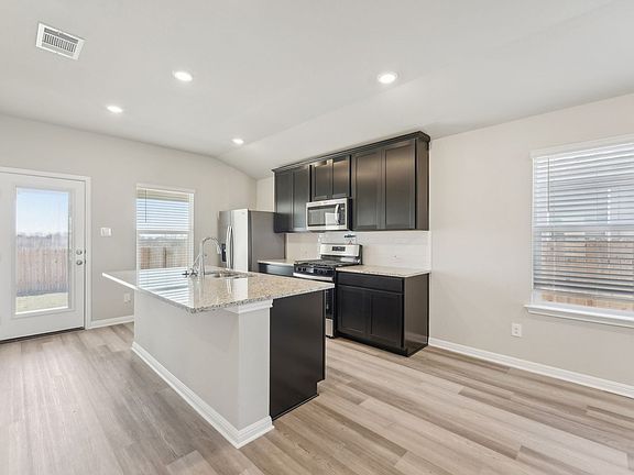 Cook a delicious meal in this beautiful kitchen.