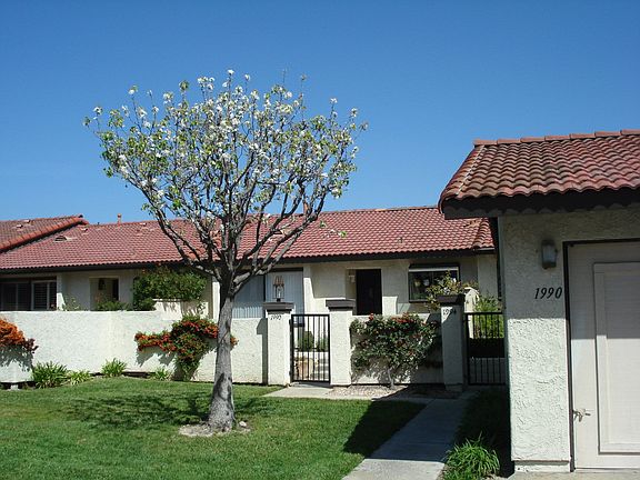 Front entry with gate,patio tile roof and garage