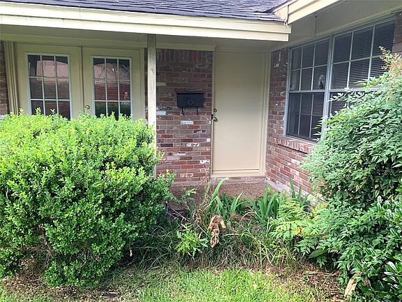 View of front door and also French Doors leading to formal living room