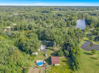 9148 W South River Dr, Grant, MI 49327