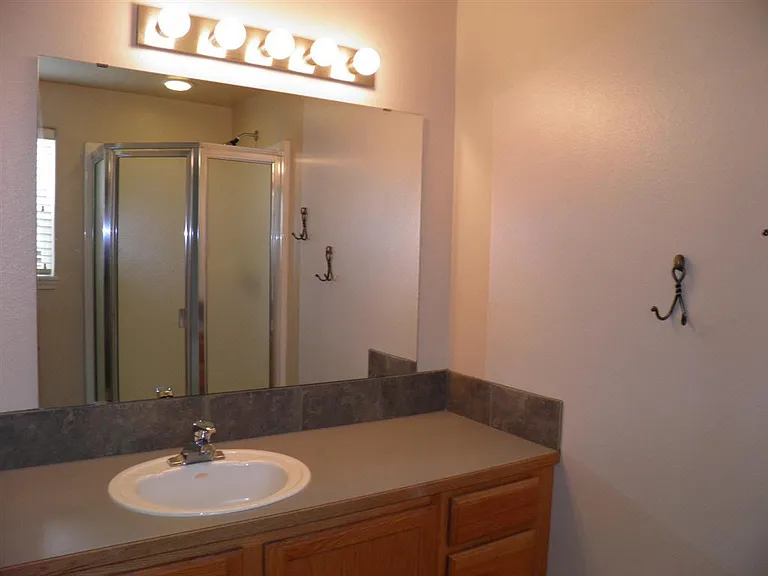 3340 NE Mendenhall Dr — Photo 13