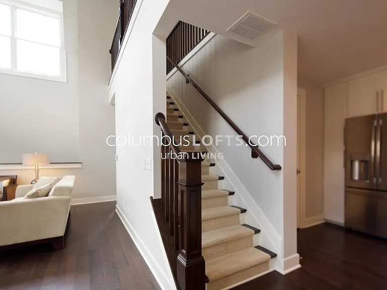 stairs to upper level, which has 2 more private bedrooms and one "Jack-and-Jill" full bathroom in between them.