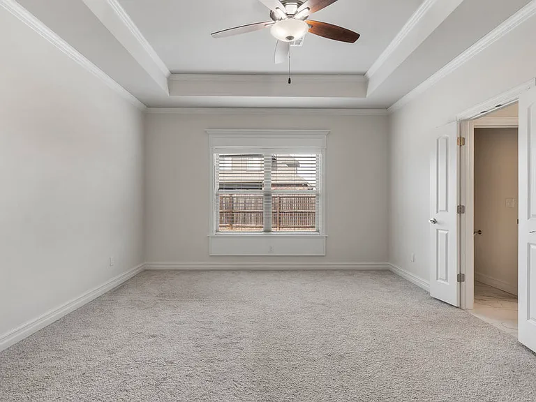 Large Primary bedroom with tall ceilings