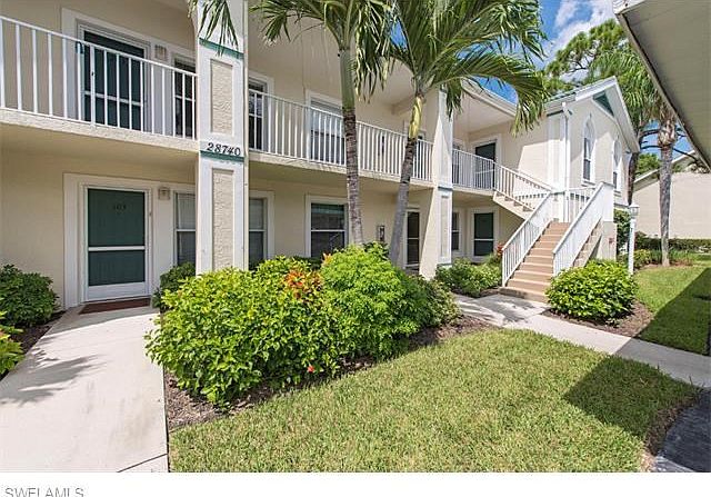 1st floor unit with covered car port - fully furnished