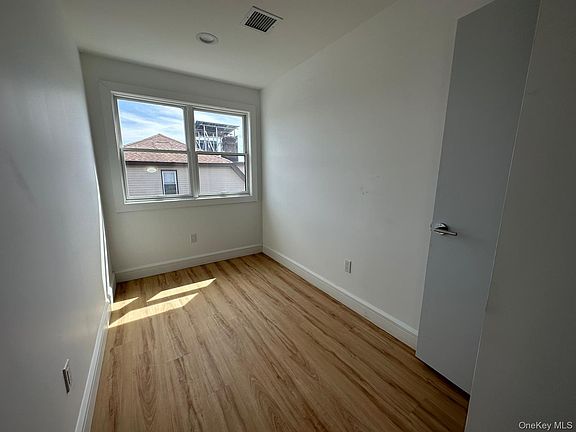 4th image of 8605 Beach Channel Drive