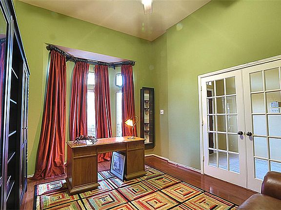 This study is a perfect spot to get work done! It features beautiful wood floors, french doors and a large window letting in lots of natural light.