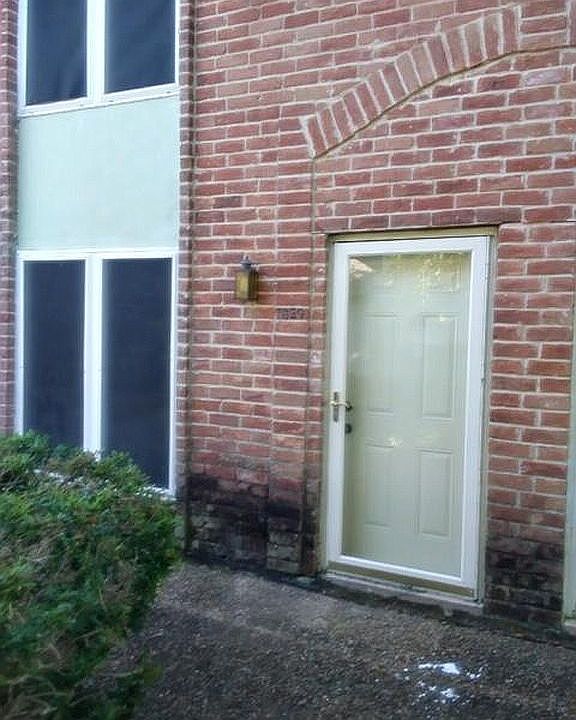 Two story brick entrance