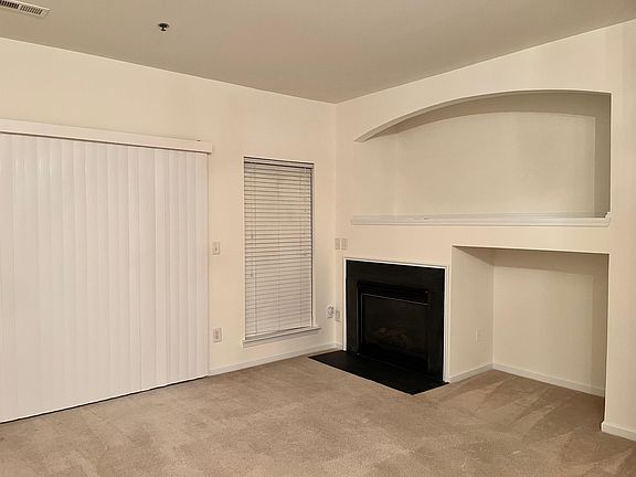 Living room w/ fireplace on main level