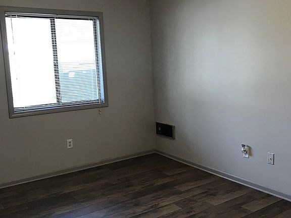 Bedroom with ceiling fan.