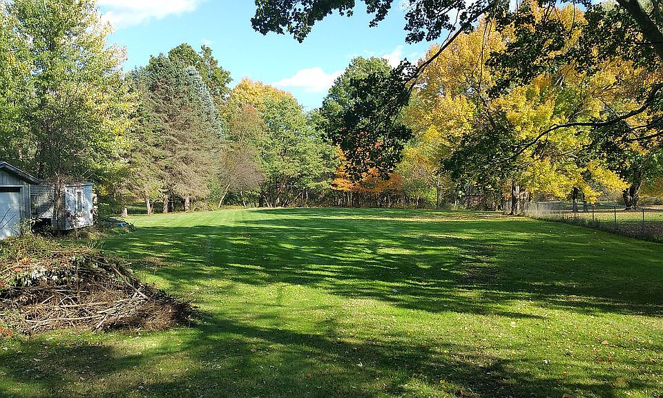 View of back acre from patio