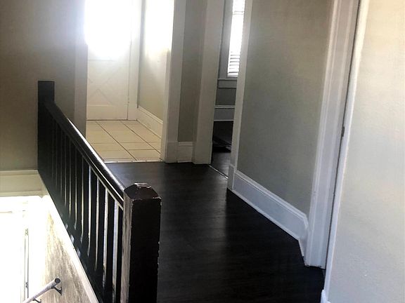 Hallway to bedroom, living area and flex/media room