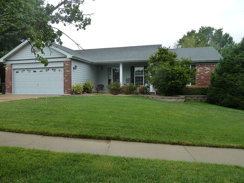 Front of home on quiet cul-de-sac
