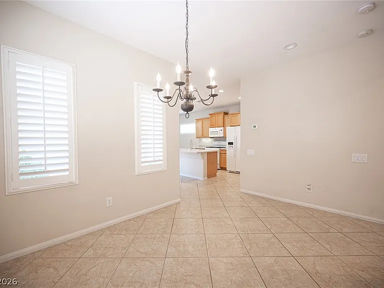 10474 Howling Coyote Ave — Photo 13