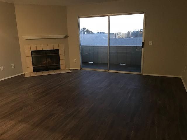 Living room w/balcony (for BBQ, outdoor furniture) and Fireplace!