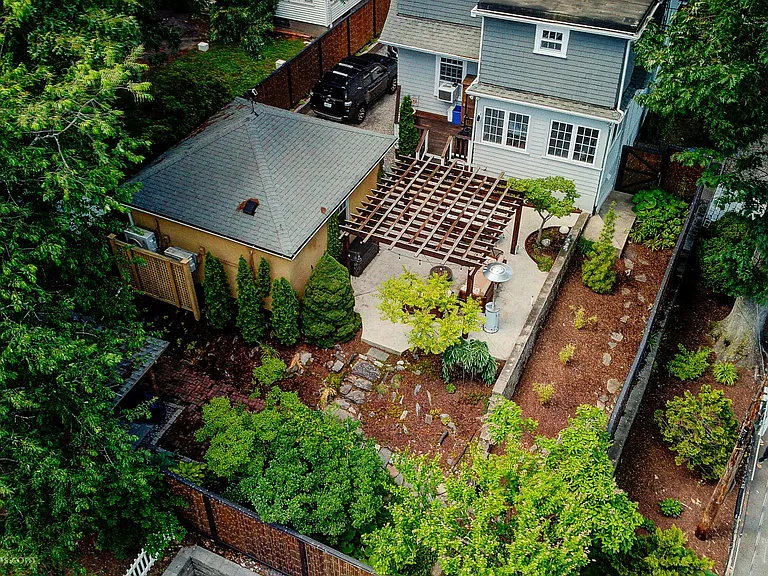 Well manicured and landscaped backyard.
