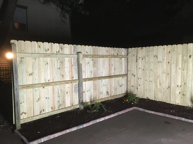 Updated pic with new fence and bricks for flower bed. The patio will be pressure washed.