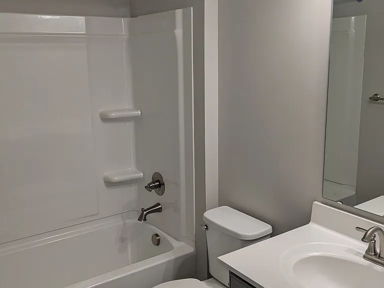 Guest bathroom next to guest bedroom and across the hall from the office.