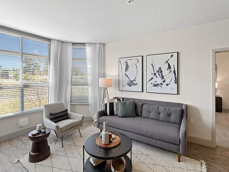 Unit Living Room with Large Windows and Natural Light at Aventine Apartments in Hercules, CA 94547