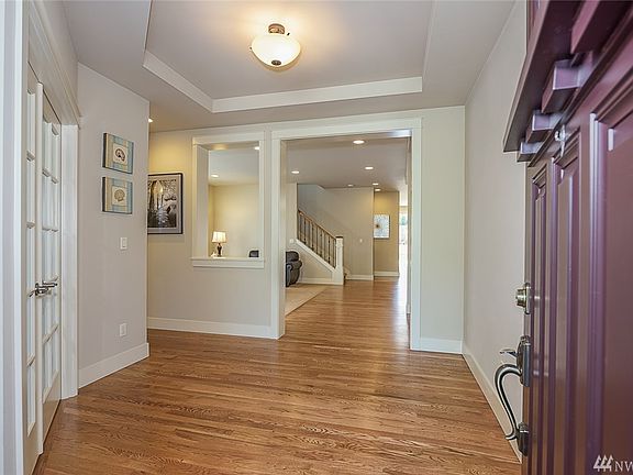 Welcoming entry with recessed ceilings.