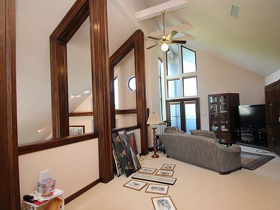 Oak beams wrap into loft