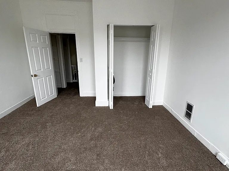1st bedroom is 14 x 14ft. Vantage point it from the window. Fits a king size bed set.